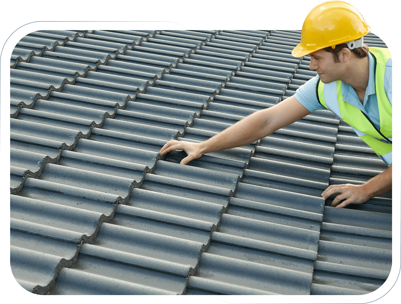 0a Worker inspecting roof tiles on a construction site.